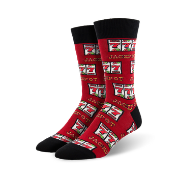 red crew length men's socks, featuring a pattern of slot machines with cherries, lemons, and bells printed on them. jackpot is printed on the slot machines.  