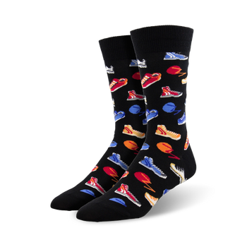 black crew socks with fun pattern of colorful sneakers, basketballs, and tennis balls.    