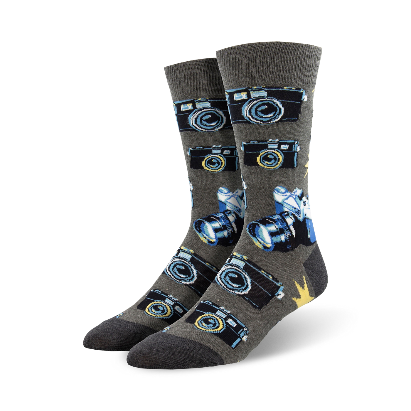 A pair of grey crew socks with a pattern of vintage cameras and lenses in blue and black. 