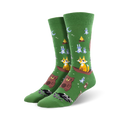 Crew socks in green with illustrated foxes, bears, bunnies, and raccoons enjoying a camping scene. 