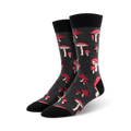 A pair of dark grey crew socks adorned with a scattered pattern of red and white mushrooms. Fun and quirky!