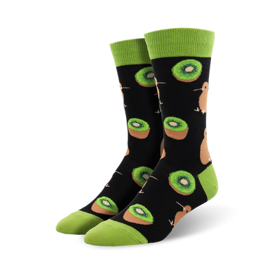 black crew socks with green toe and heel feature kiwi fruit and kiwi birds pattern.  