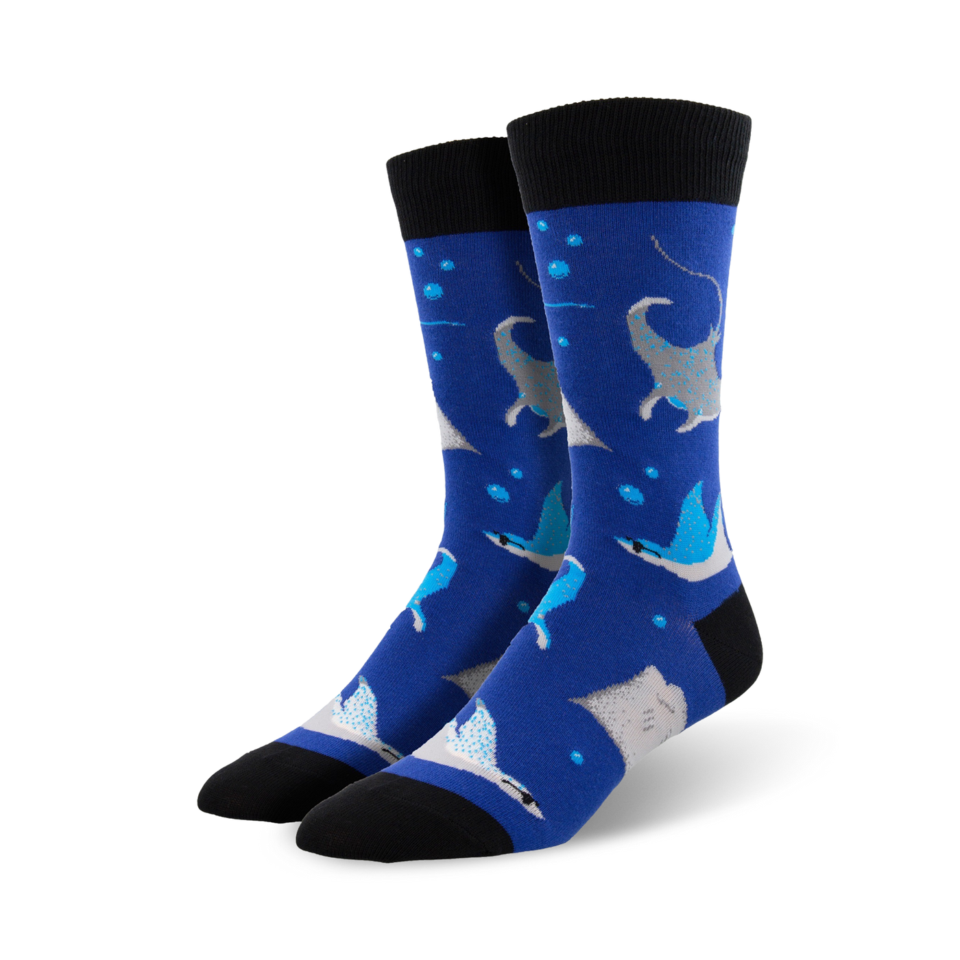 A pair of men's crew socks in blue, adorned with gray manta rays, light-blue stingrays, and white bubbles.  The socks have black cuffs.