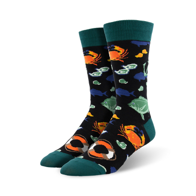 black crew socks with a pattern of sea creatures, buoys, and a life preserver.  