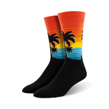 black men's crew socks with an orange cuff, palm tree design in orange, blue, and green, and blue and orange striped background.   