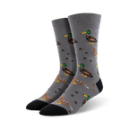 Gray crew socks with a repeating pattern of brown and green mallard ducks.  A fun, quirky design.
