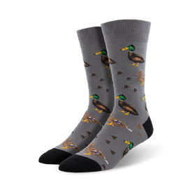 gray crew socks with a pattern of green-headed ducks in various poses and duck footprints.  