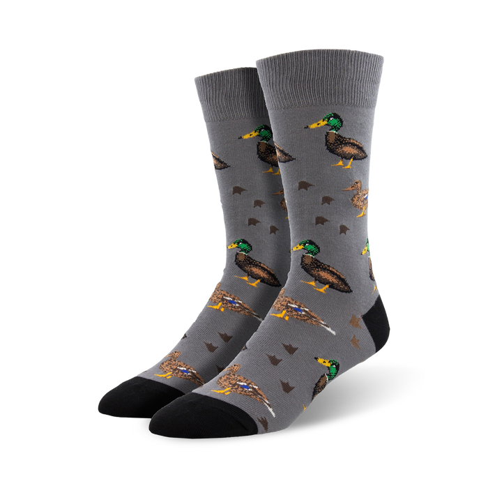 gray crew socks with a pattern of green-headed ducks in various poses and duck footprints.   }}