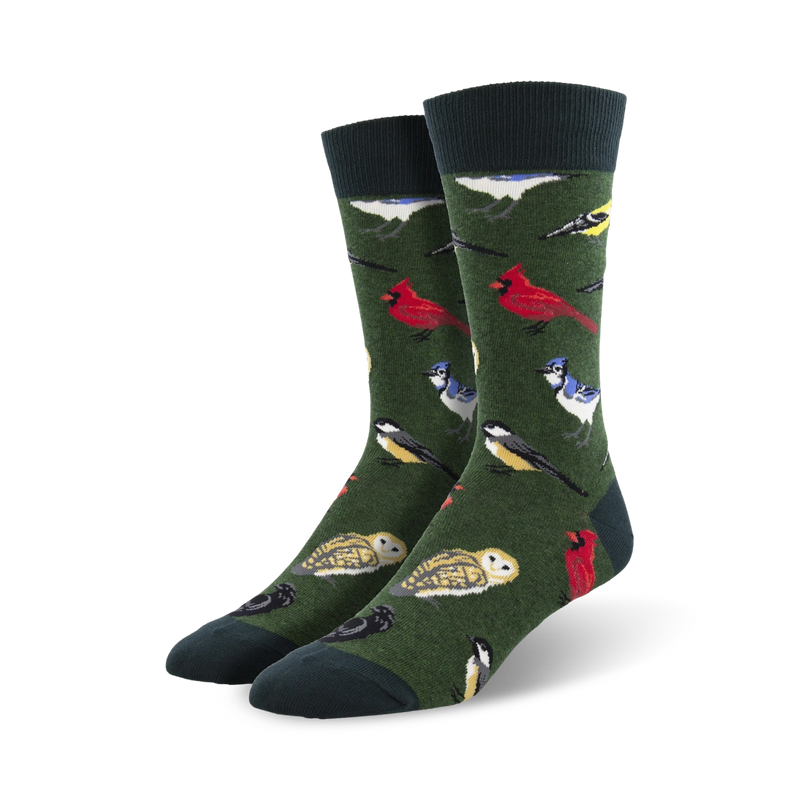A pair of men's crew socks in deep green with colorful birds like cardinals, blue jays, owls, and more.