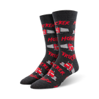Pair of dark grey crew socks featuring red semi-trucks and the text 'Mother Trucker' repeated across the design.