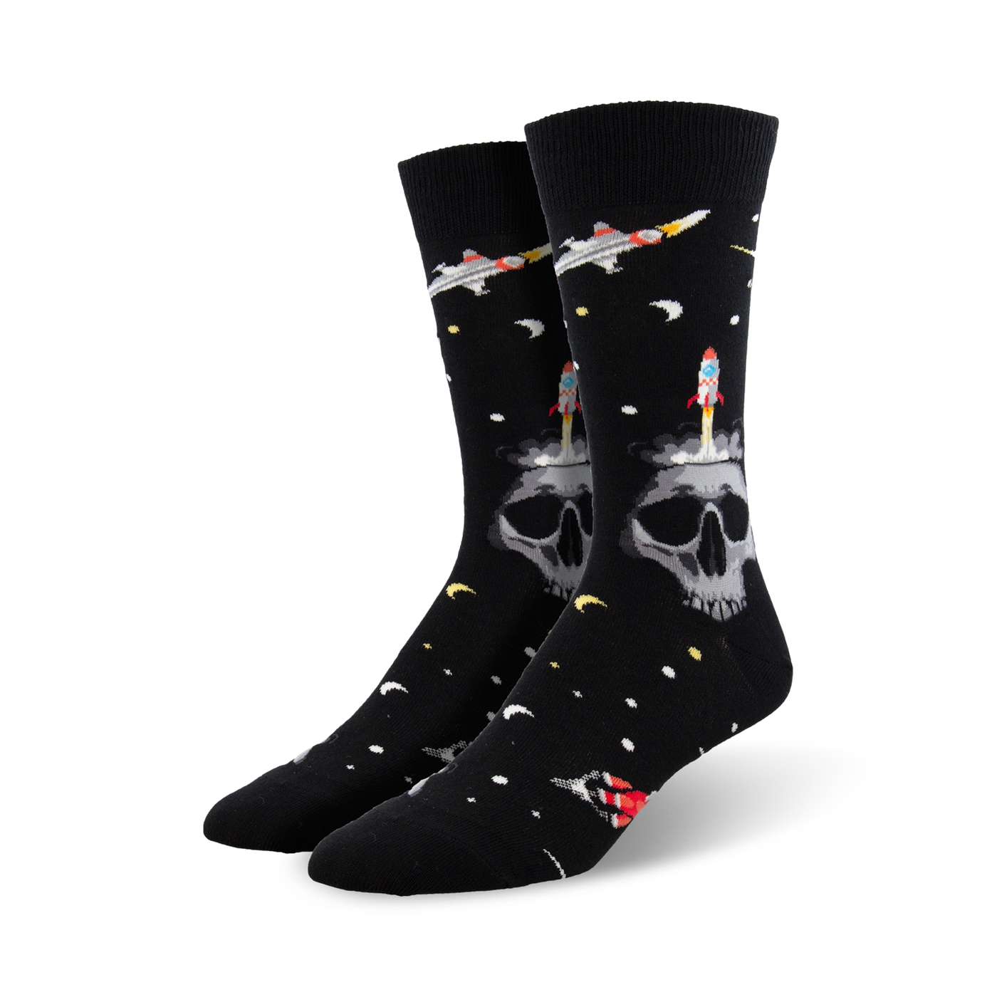 Pair of black crew socks with a skull, rocket, and spaceship design against a space-themed background.