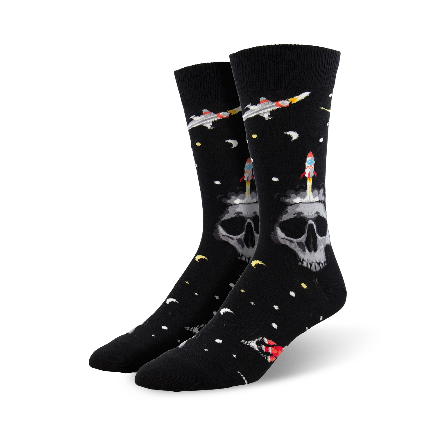 Pair of black crew socks with a skull, rocket, and spaceship design against a space-themed background.