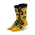 Pair of crew socks; yellow and black, or red and black.  Feature a bold graphic of a black snake with teal accents, wrapping around the sock.