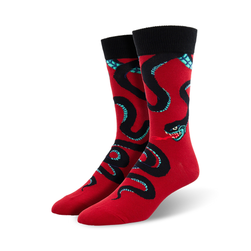Lifestyle shot showing the red 'Slither Me Timbers' socks on a person's feet.