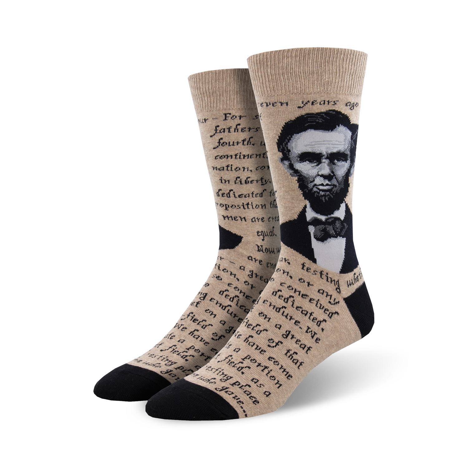 Crew socks in beige and black, featuring a portrait of Abraham Lincoln and text from the Gettysburg Address.