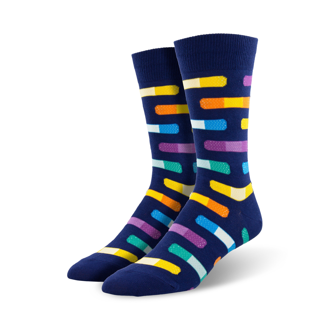 Pair of navy blue crew socks with multicolored pill-shaped designs.  The pills are orange, yellow, purple, teal, and white.