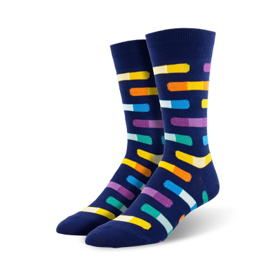 colorful bandages in various colors adorn these blue, funky, and fabulous crew socks made for men. 