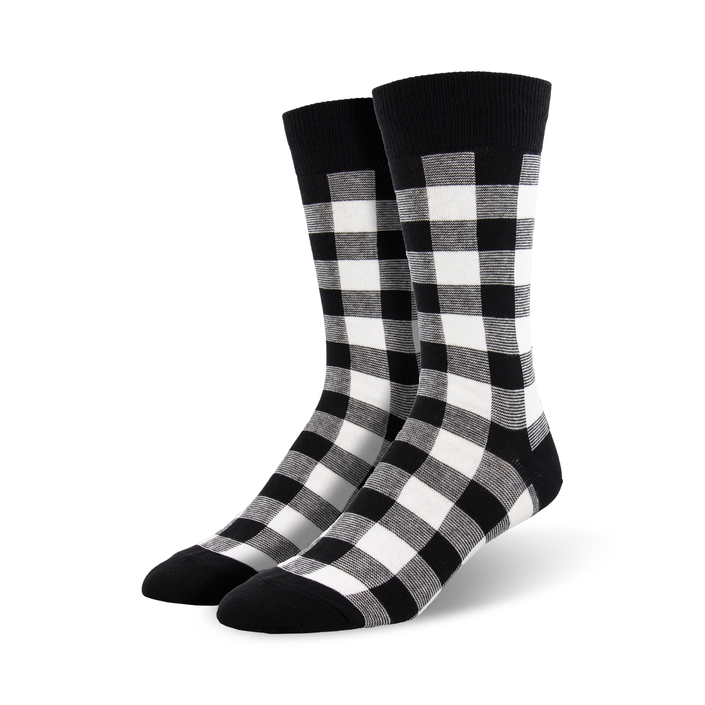 Close-up studio shot of black and white buffalo plaid crew socks.