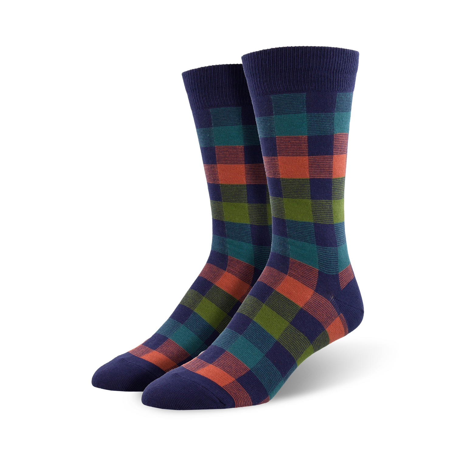 Studio shot of navy blue crew socks with coral and green buffalo plaid pattern.