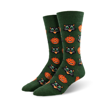 vintage halloween black cat and pumpkin crew socks: mens, crew length, green socks with a festive halloween pattern of black cats with green eyes and orange pumpkins with orange eyes.   