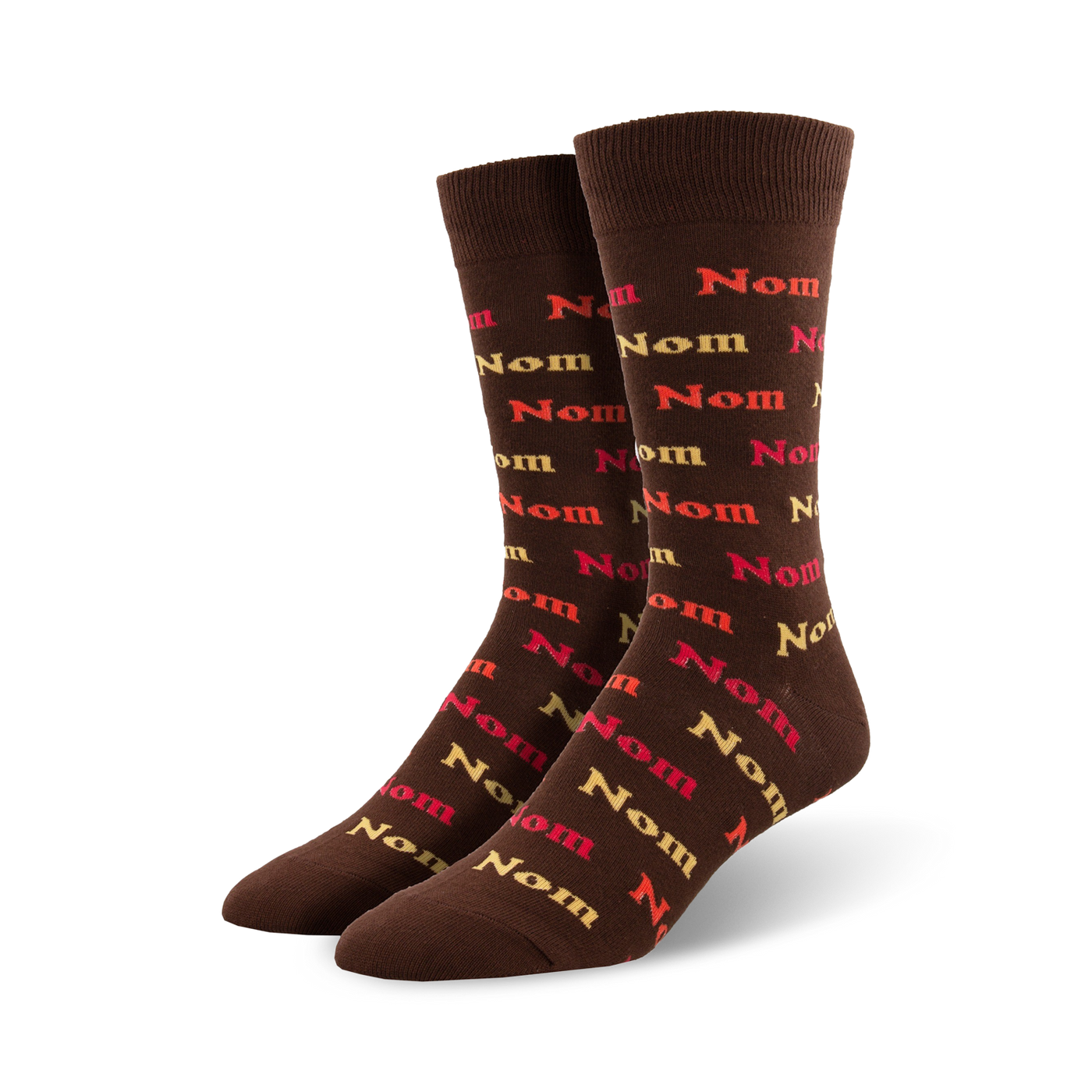 Pair of brown crew socks with a repeating pattern of the word 'nom' in orange, red, and beige.
