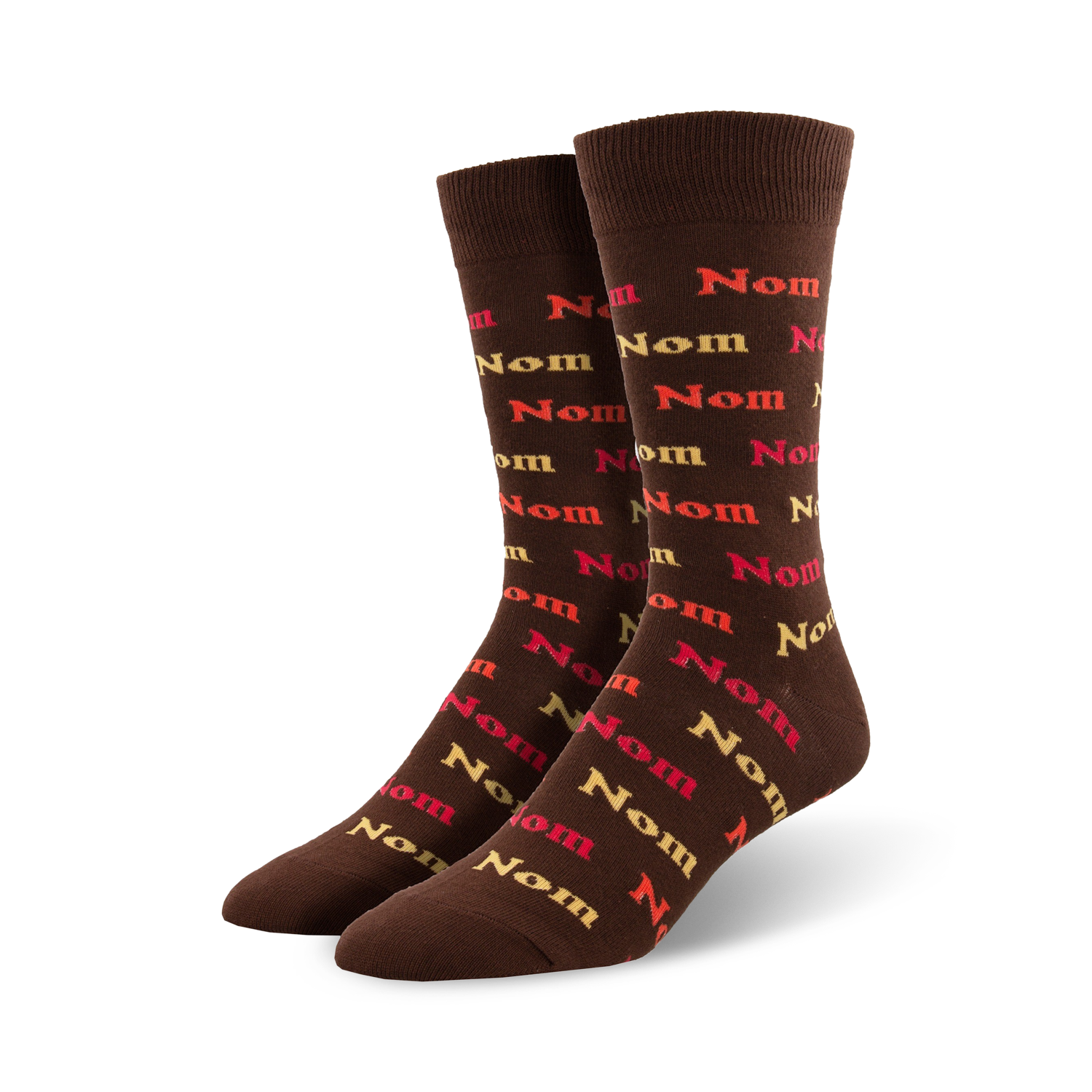 Pair of brown crew socks with a repeating pattern of the word 'nom' in orange, red, and beige.