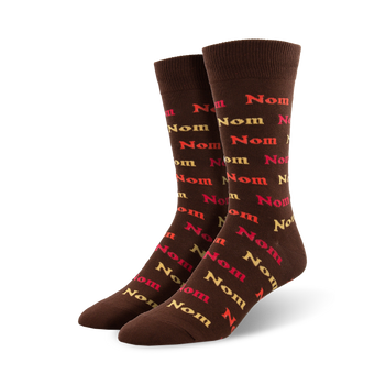 brown crew socks with multi-colored "nom" graphics, perfect for thanksgiving.  