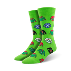 Pair of crew socks, green and red, with a whimsical pattern of illustrated ugly Christmas sweaters.