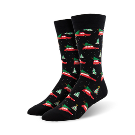 black crew socks with red cars carrying green christmas trees. perfect for the holiday season.  