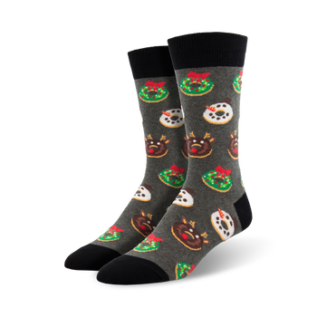 mens crew socks featuring christmas-themed pattern of cartoon doughnuts and reindeer in festive red, white, and green colors.   