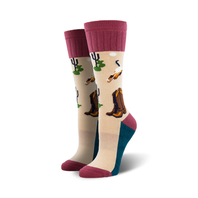 beige boot socks with pink ribbed cuff feature pattern of cowboy boots, cacti, and skulls.  