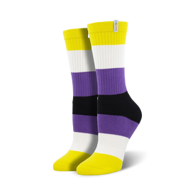 horizontal stripes of yellow, white, purple, black, and white make up this pair of non-binary pride crew socks for men and women.   
