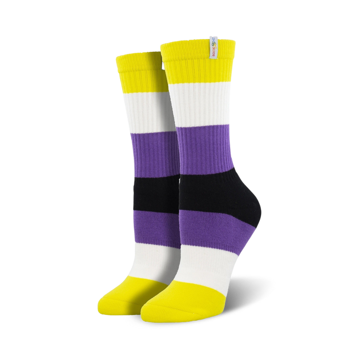 horizontal stripes of yellow, white, purple, black, and white make up this pair of non-binary pride crew socks for men and women.   