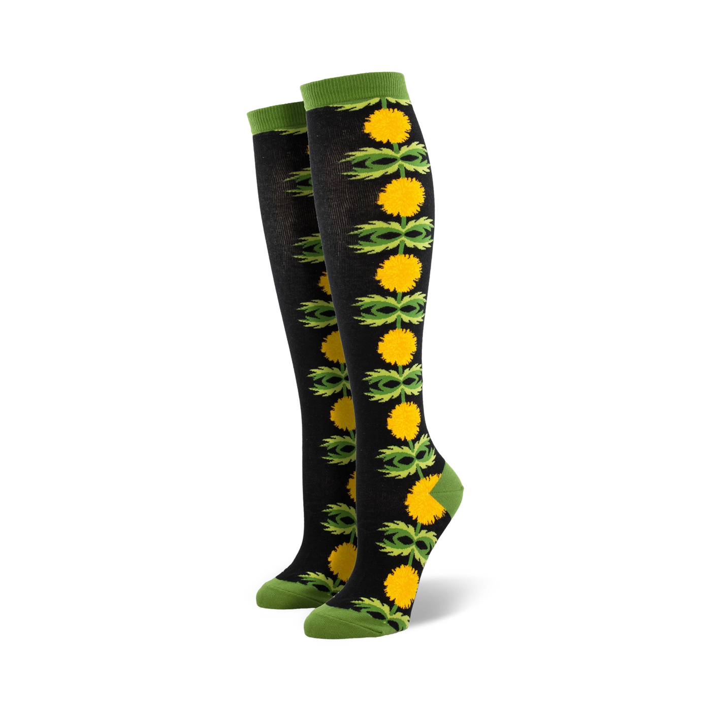 Pair of black knee-high socks with a vertical pattern of yellow dandelions and green leaves.