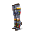 Pair of blue knee-high socks with a bookshelf design. Books, glasses, and brown stripes are featured on a grey-blue background.