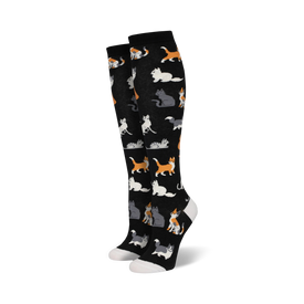 black knee high vibrant cartoon cat socks with white toe, heel, and foldover band for women.   