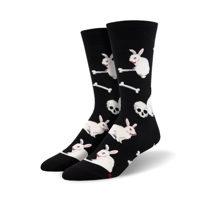 black crew socks with white cartoon rabbits, blood dripping from mouths, standing on bones and skulls.   