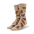 Pair of tan crew socks with a repeating pattern of orange and black monarch butterflies.