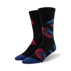 Pair of black crew socks with red and blue betta fish designs.  Features a navy blue cuff.