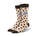 A pair of cream crew socks with brown bean characters wearing sunglasses. The socks have a 'Cool Beans' text and brown cuffs.
