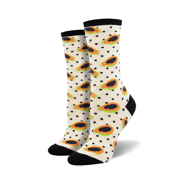white with black polka dot crew socks featuring a fun orange and green papaya pattern.   }}
