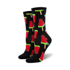 Pair of crew socks with a repeating pattern of watermelon popsicles.  The popsicles are red, pink, green, and black on a black or navy background.
