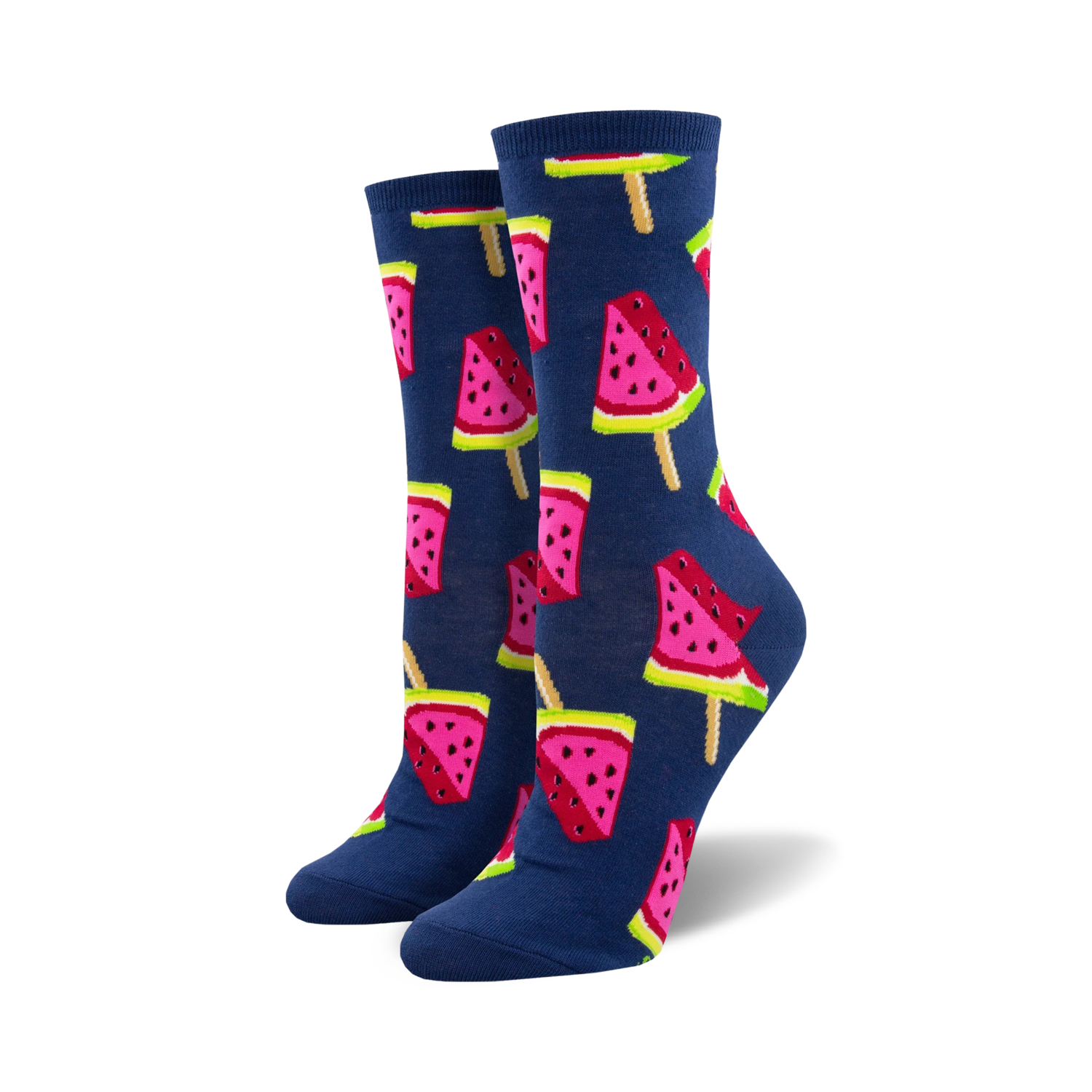 Lifestyle shot of a person's feet wearing the navy blue watermelon popsicle socks.