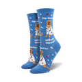 Lifestyle shot: Model wearing blue 'The Dogtor Is In' socks. Shows the socks' fit and style on a foot.
