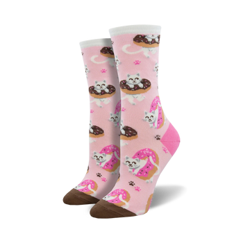 pink crew socks for women feature a cartoon cat pattern on chocolate frosted donuts with sprinkles and paw prints.  