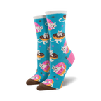 Lifestyle shot of model wearing teal Sweet Treat Kitties socks.