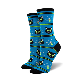 blue crew socks with a pattern of black cat faces, green stars, and black ufos with green lights. ideal for cat and space lovers.   