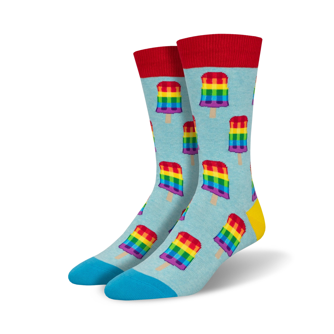 Pair of crew socks with a light blue background featuring repeating rainbow popsicle designs. Red, yellow, and blue accents.