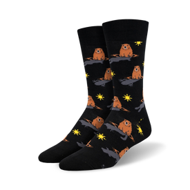 black crew socks featuring a pattern of brown groundhogs popping out of black holes in the ground with yellow suns.  