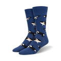 Pair of blue crew socks adorned with a repeating pattern of orcas in black and white.  A fun, whimsical design.